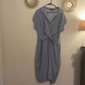 Light blue striped dress with red, dark blue and white.